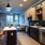 a kitchen with a table and chairs