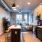 a kitchen with a table and chairs