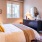 a bedroom with a large mirror